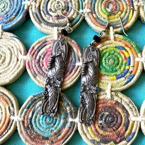 Silver dangle earrings with black beads